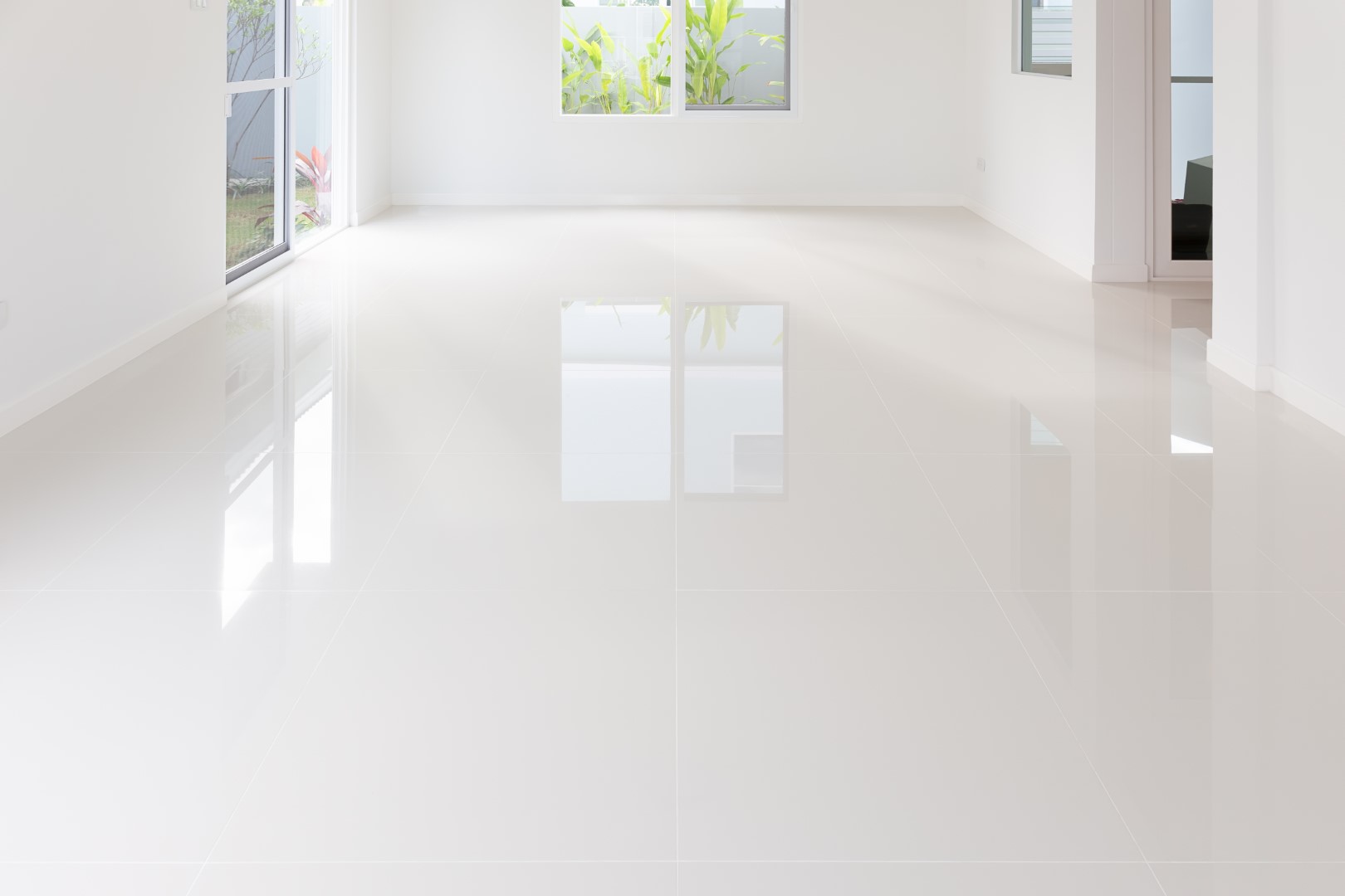 White tile floor clean condition with grid line for background.
